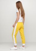 Штани-джогери жіночі літні Only Women жовті з білою смугою збоку Штани-джогери жіночі літні Only Women жовті з білою смугою збоку
